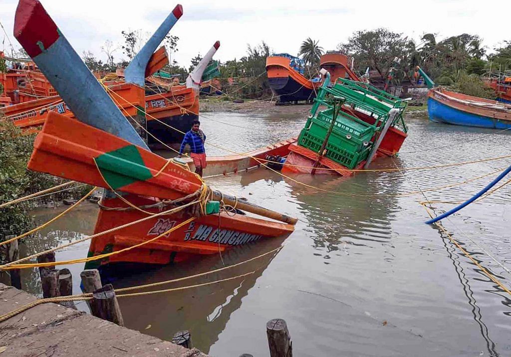 South 24 Paraganas: Damaged boats are seen partially submerged, in the aftermath of Cyclone Amphan, near Sunderbans area in South 24 Paraganas district of West Bengal, Friday, May 22, 2020. (PTI Photo)