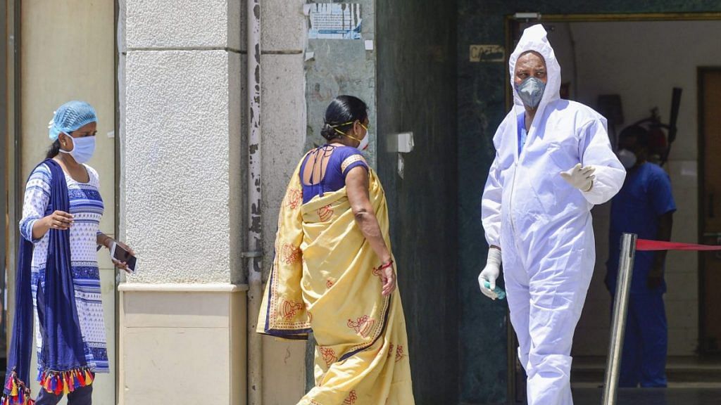 Suspected Covid-19 patients arrive at a government hospital for tests in New Delhi | Photo: Kamal Kishore | PTI