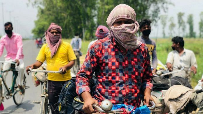 Neither May's scorching heat nor the fact that they have been on their cycles for five days, these young labourers are determined to make it back to their village in UP | Jyoti Yadav | ThePrint