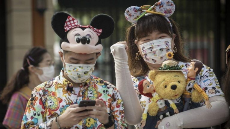 With masks & fever checks, it’s a ‘whole new world’ as Shanghai Disneyland reopens in China