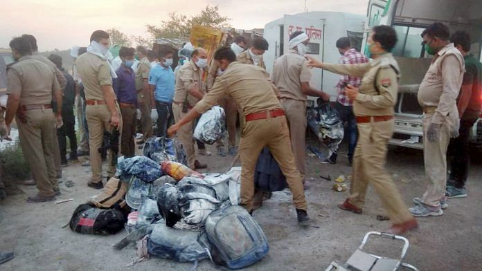 Police officials inspect the spot where at least 24 migrants were killed and several injured after two trucks carrying labourers collided with each other in wee hours, in Auraiya, Saturday, May 16, 2020 | PTI