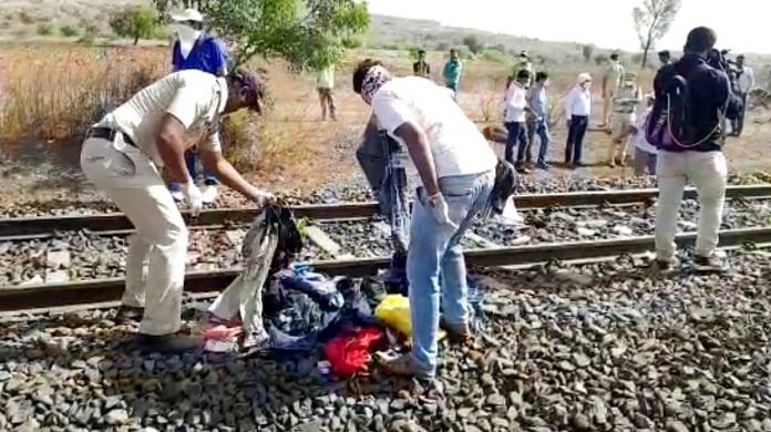 Police officials investigating at the railway track where 16 migrant workers died in a train accident in Aurangabad on 8 May 2020