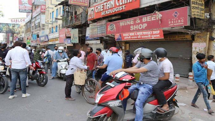 A crowd gathered at a shop in Darya Ganj | Manisha Mondal | ThePrint