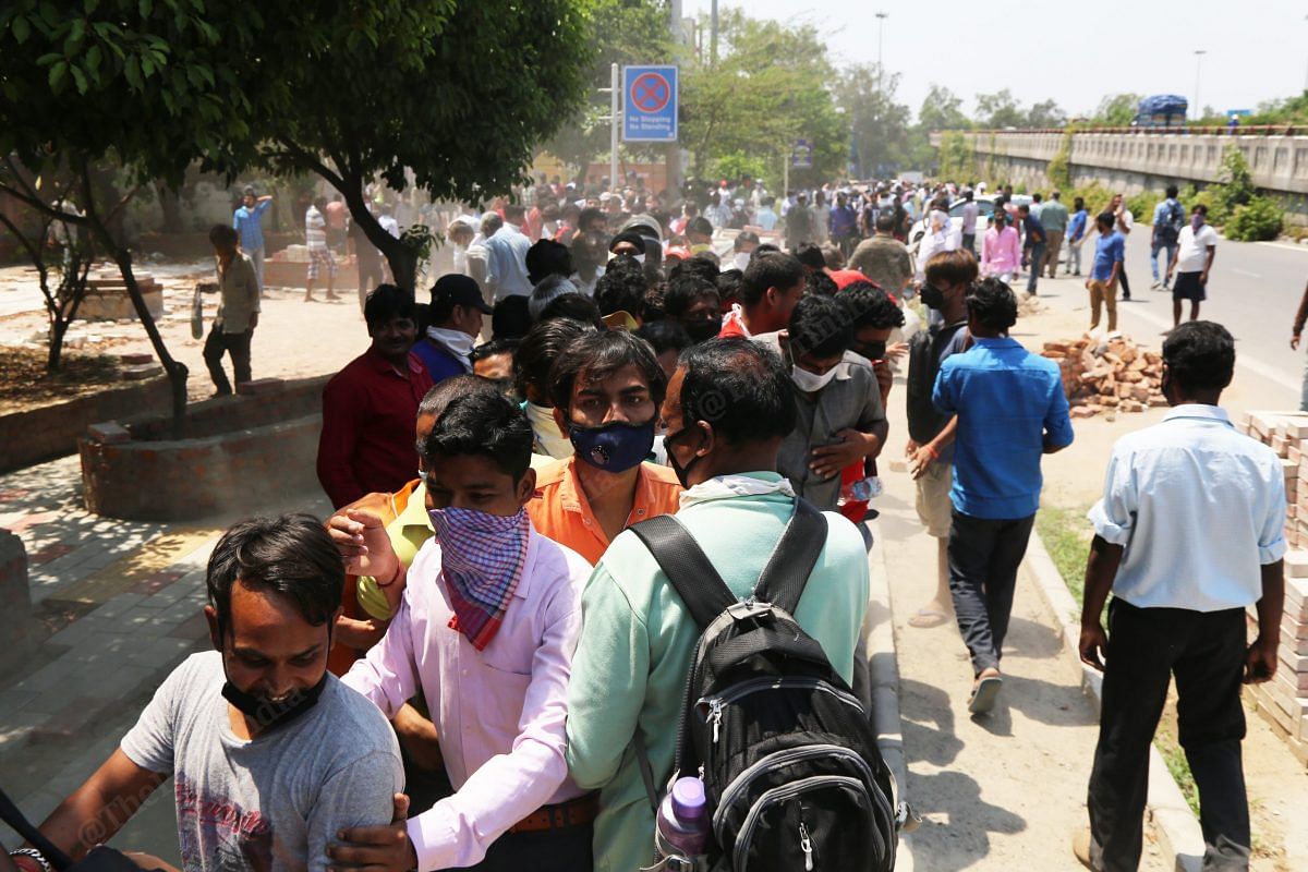 Crowd push each other while standing in queue in Nehru Nagar | Photo: Manisha Mondal | ThePrint