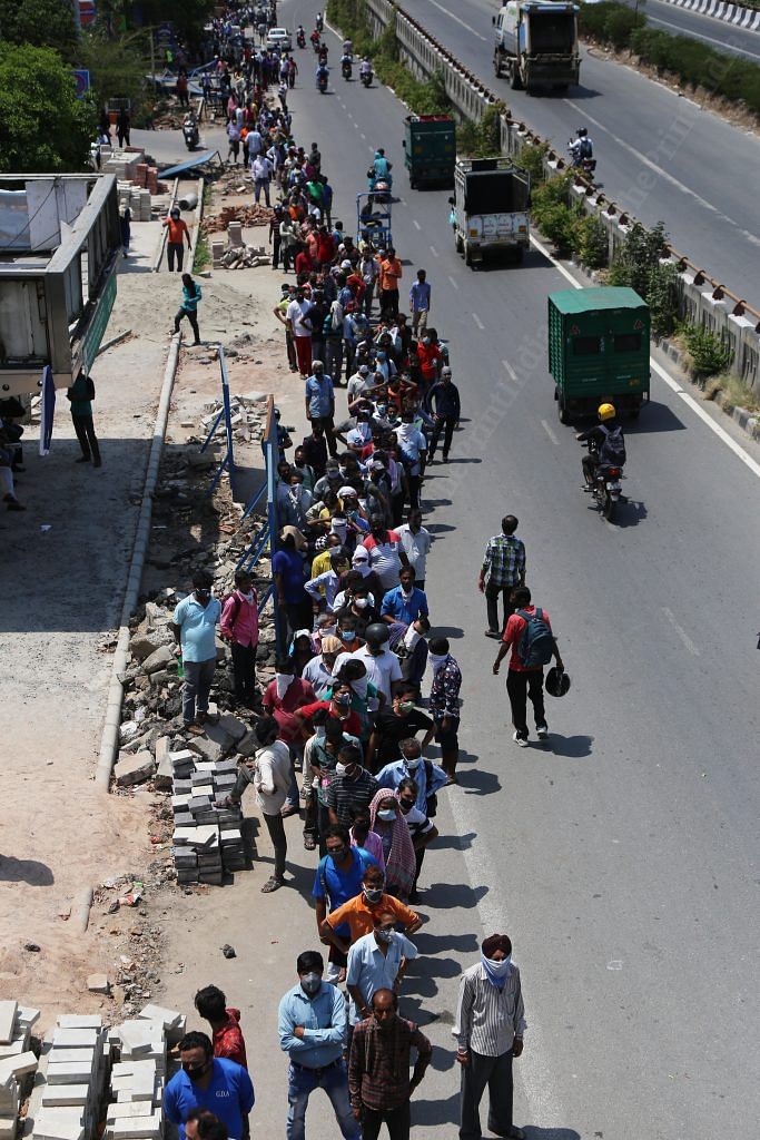 The line for alcohol in Nehru Nagar was more than a kilometer long | Photo: Manisha Mondal | ThePrint