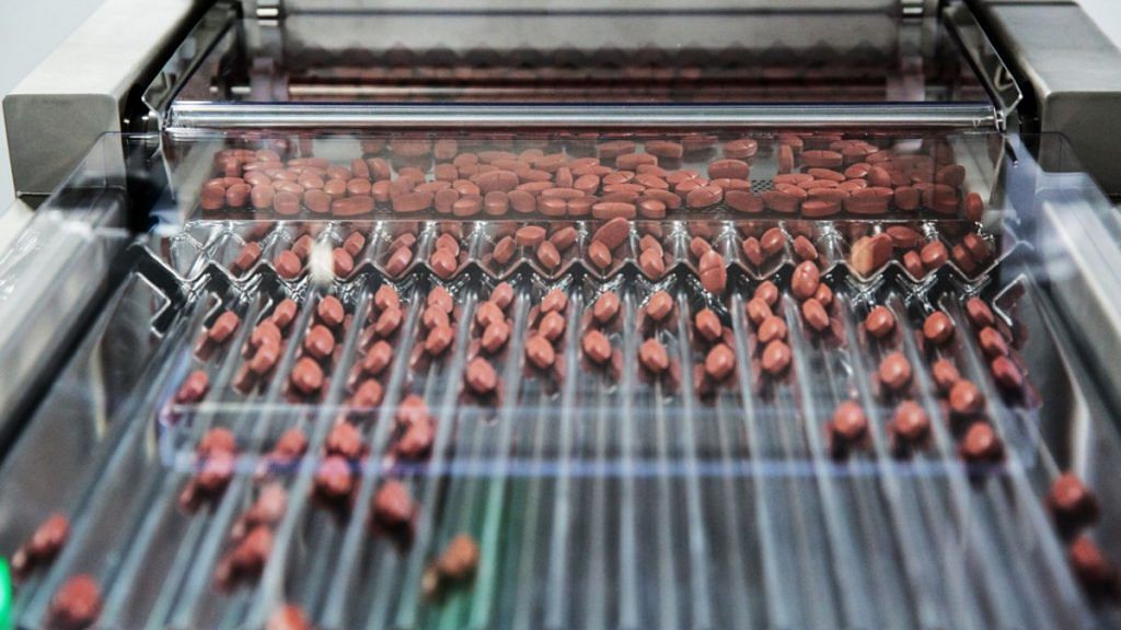File photo of pills moving through a sorting machine at a pharmaceutical plant in Andhra Pradesh | Sara Hylton | Bloomberg