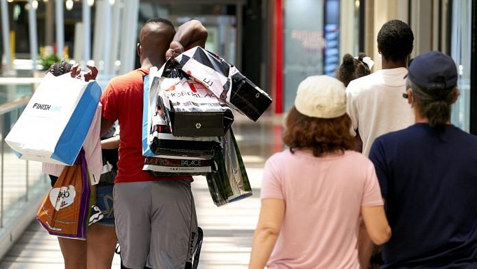 Shoppers carry bags at the Galleria Dallas mall in Dallas, Texas, U.S. | Photographer: Cooper Neill | Bloomberg