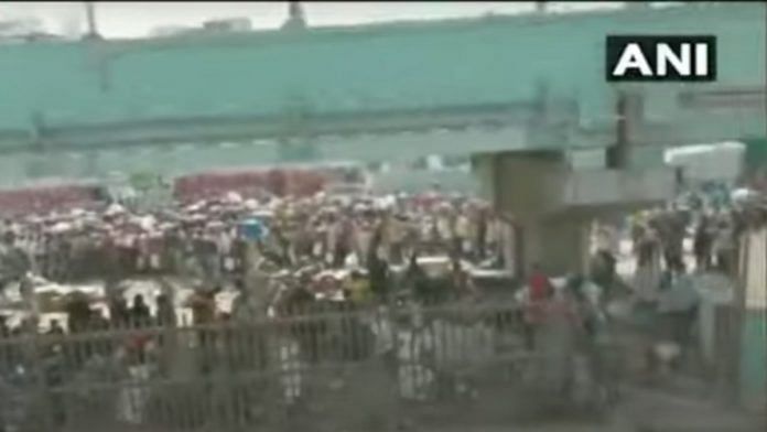 Screenshot from an ANI video shows the crowd that gathered at Bandra Terminus Tuesday morning | ANI