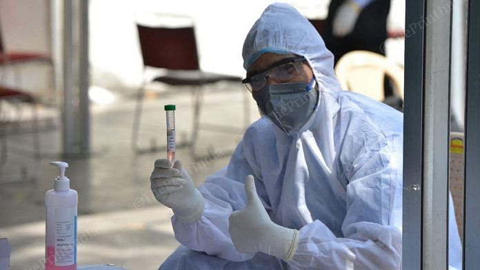 A health worker conducting a coronavirus test in Delhi | Representational image | Suraj Singh Bisht | ThePrint
