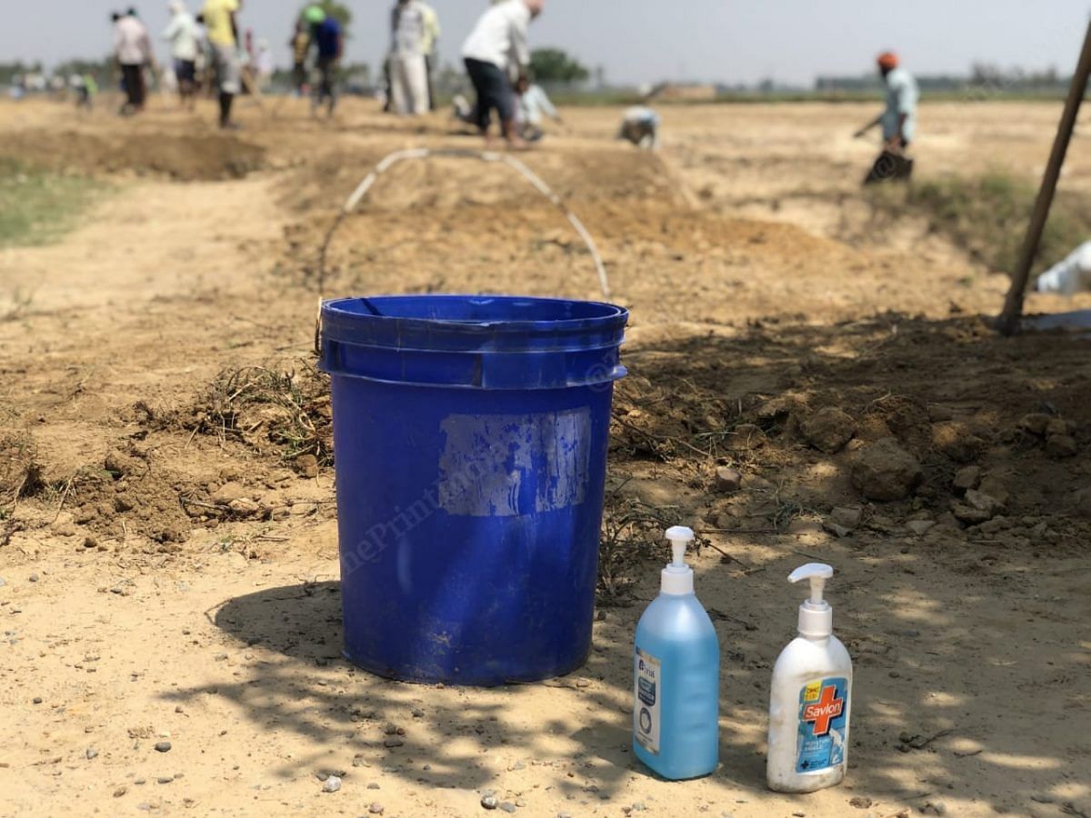 On the fields there are bottles of sanitisers and special attention is given to social distancing | Photo: Jyoti Yadav | ThePrint