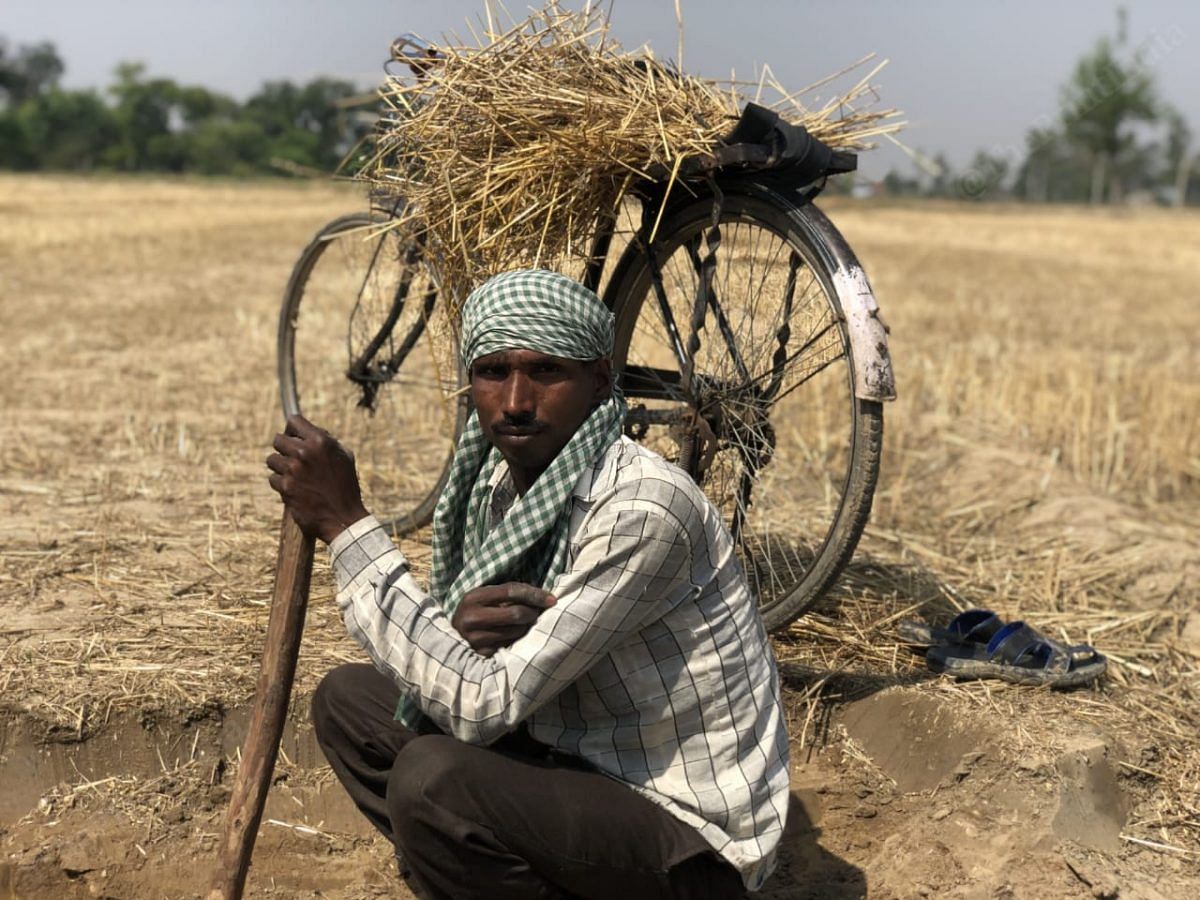 Ram kumar, 35 years old labourer from Bilpur village, says that hardships are the predominant factor in his life but the only thing that stays constant and never leaves his side is his cycle | Photo: Jyoti Yadav | ThePrint