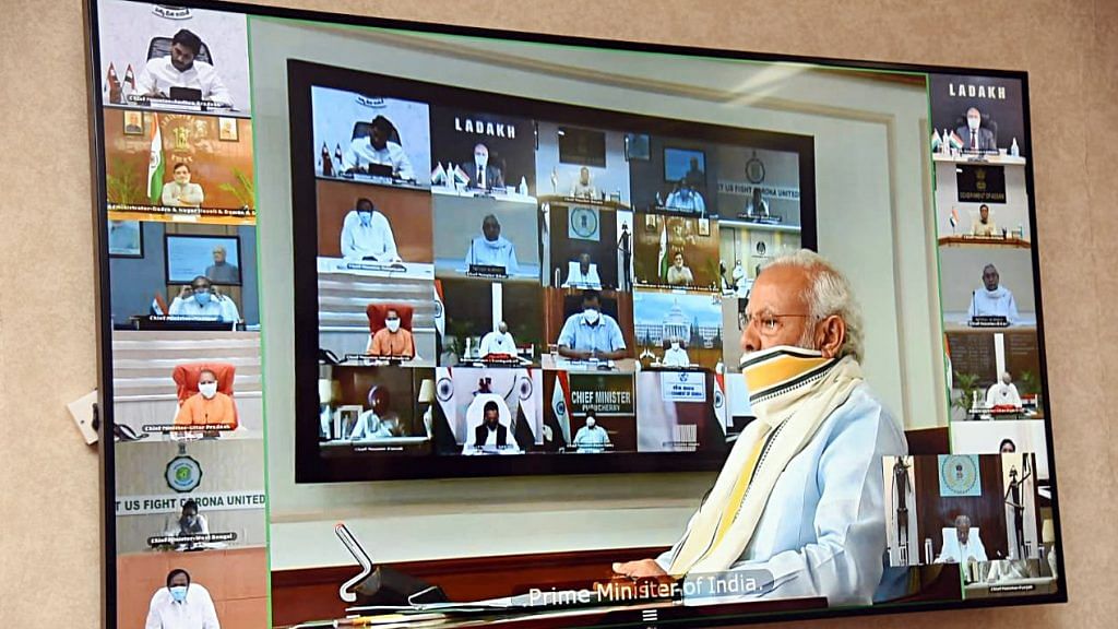 File image of PM Narendra Modi and state chief ministers speaking via video conferencing | Photo: ANI