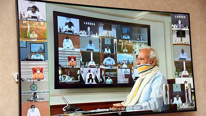 File image of PM Narendra Modi and state chief ministers speaking via video conferencing | Photo: ANI