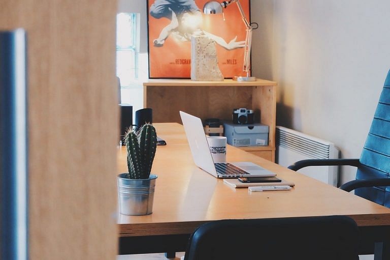 Open offices might seem designed to spread germs, but it will survive the Covid crisis