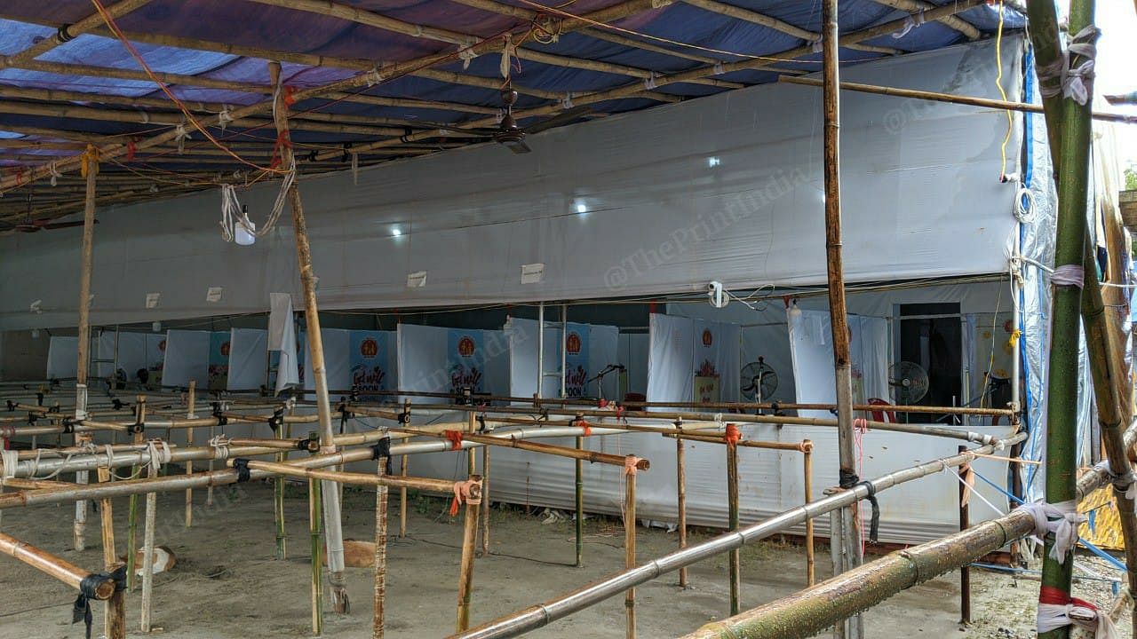 The registration booth setup for migrants at the Assam-West Bengal border where screening takes place. The returnees are then and taken to a nearby swab collection facility. | Photo: Yimkumla Longkumer | ThePrint