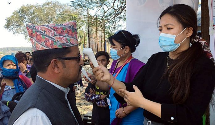 People coming from India undergo thermal screening at Kakarbhitta border in Nepal (representational image). | ANI