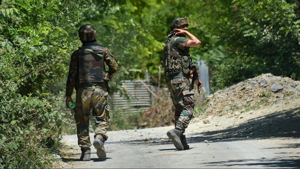 Army personnel during an encounter with militants at Pampore in Pulwama district of south Kashmir, Thursday.| PTI