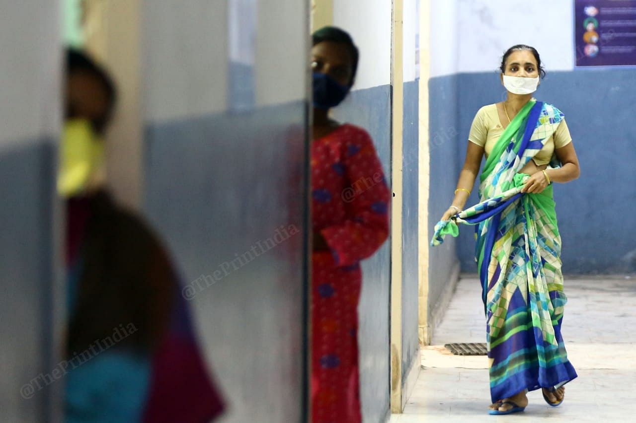 Female covid positive patients were seen gossiping among themselves only through their entry gates| Photo: Suraj Singh Bisht | ThePrint