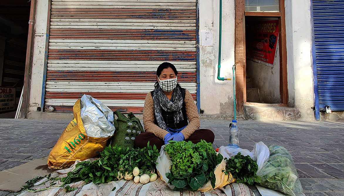 Thinlas Chron, 35, sell vegetables in Leh Market | Photo: Sajid Ali | ThePrint