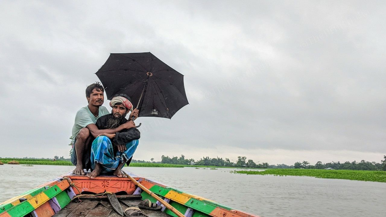 Residents of the char areas use long wooden boats to go to and from their houses. | Yimkumla Longkumer | ThePrint