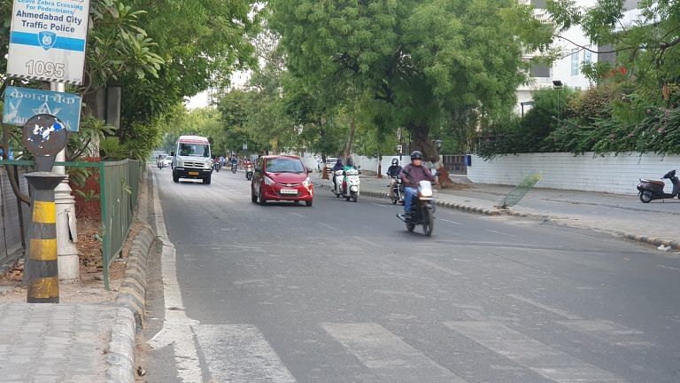Masks, temperature checks & long wait outside hospitals — Ahmedabad limping back to normal