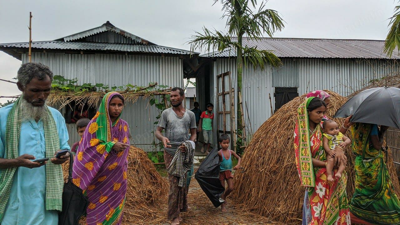 The family of a migrant worker that lives in a tin house in a remote part of Assam's Dhubri district known as Nayeralga Part II. The only way to access their house is by a 40-minute boat ride from the nearby town of Bilasipara | Yimkumla Longkumer