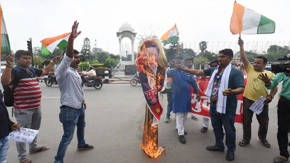 LJP activists burn an effigy of Chinese President Xi Jinping during a protest in Patna on 17 June 2020. The protests are against China after 20 Indian soldiers were killed in violent clashes with the PLA in Galwan Valley Monday night | PTI