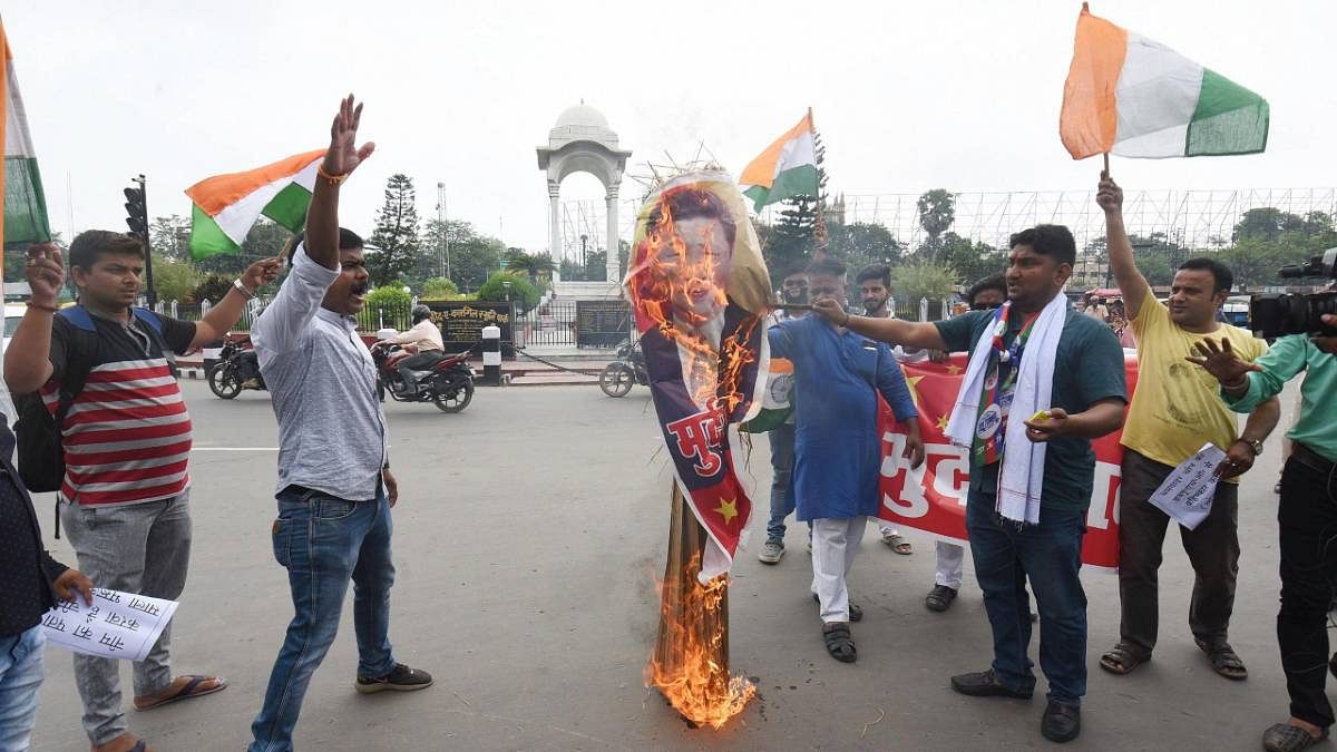 Protest LJP activists burn an effigy of Chinese President Xi Jinping during a protest in Patna on 17 June 2020. The protests are against China after 20 Indian soldiers were killed in violent clashes with the PLA in Galwan Valley Monday night | PTI