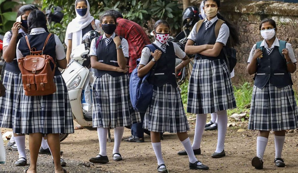 Kozhikode: Students outside a school after giving a Board examination, May 27, 2020 | PTI