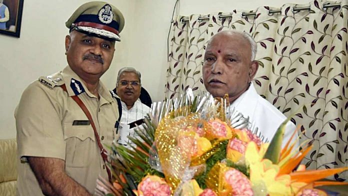 Karnataka DGP Praveen Sood with Chief Minister B.S. Yediyurappa after taking charge this February | File image | ANI