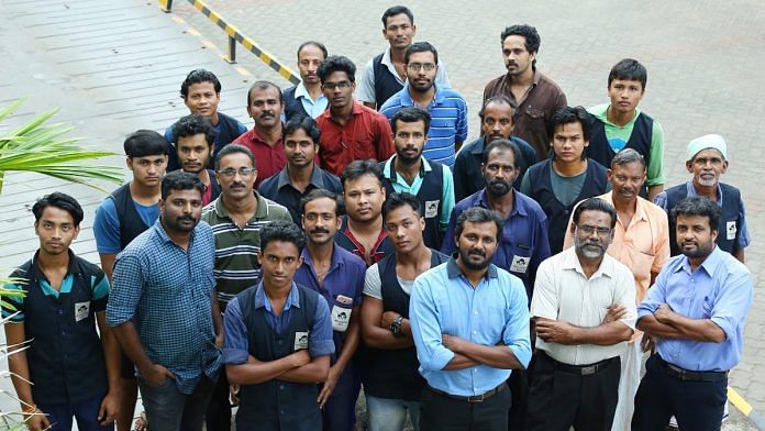 WhatsApp Image 2020-06-01 at 5.57.26 PM Mezhukkattil Mill executive director Ubais Ali (third from right in thr front row) with his employees | By special arrangement