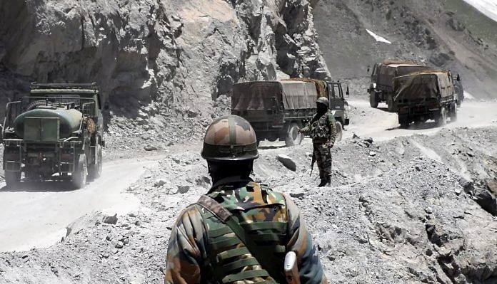 An Army convoy moving towards the Zojilla pass, in Drass