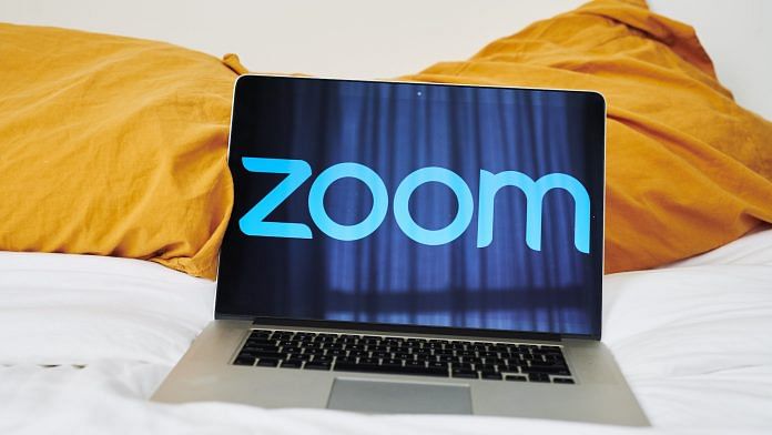 The logo for the Zoom Video Communications Inc. application seen on a laptop