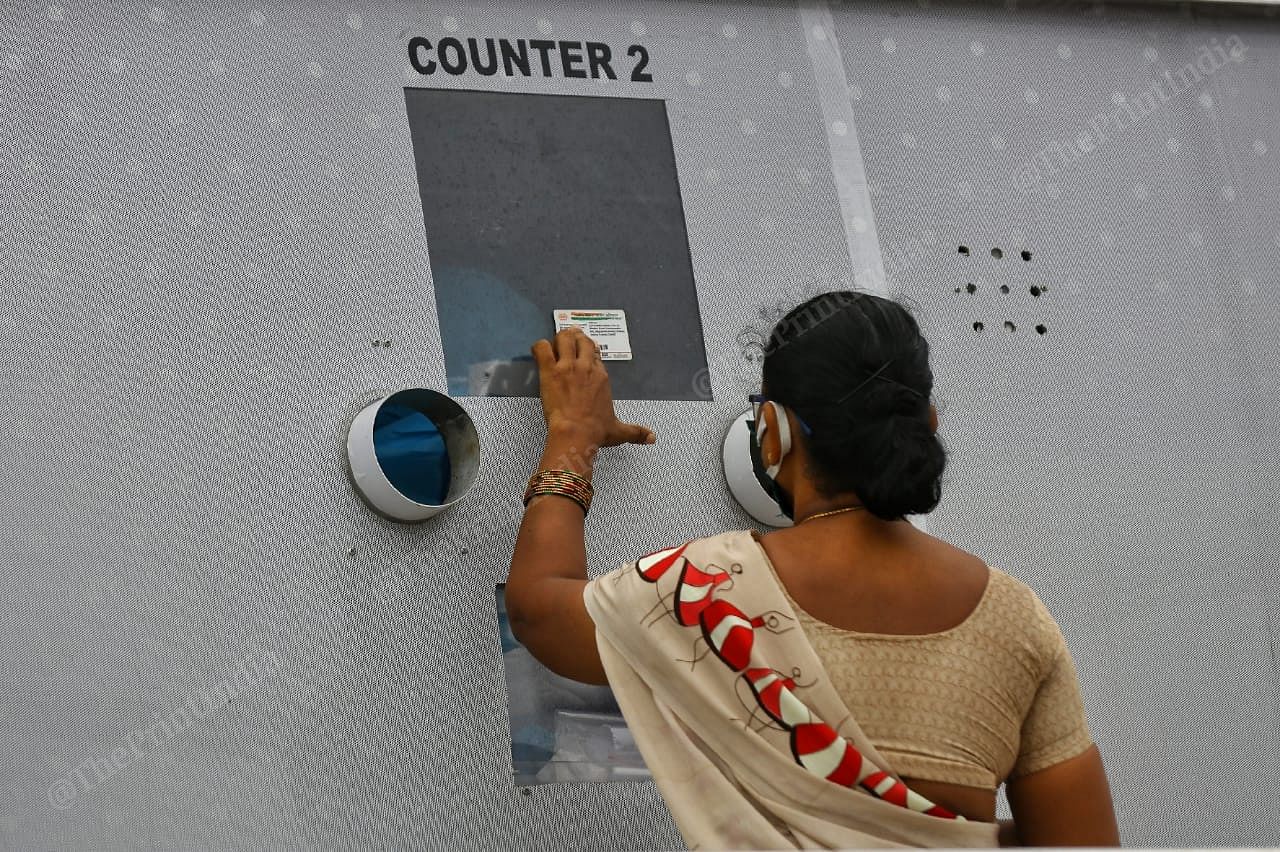 A Vijayawada woman flashes her ID at the mobile testing facility | Suraj Singh Bisht | ThePrint