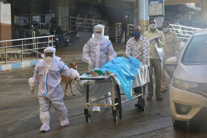 Healthcare staff tend to a Covid-19 patient at Gandhi Medical College & Hospital, Secunderabad | Suraj Singh Bisht | ThePrint