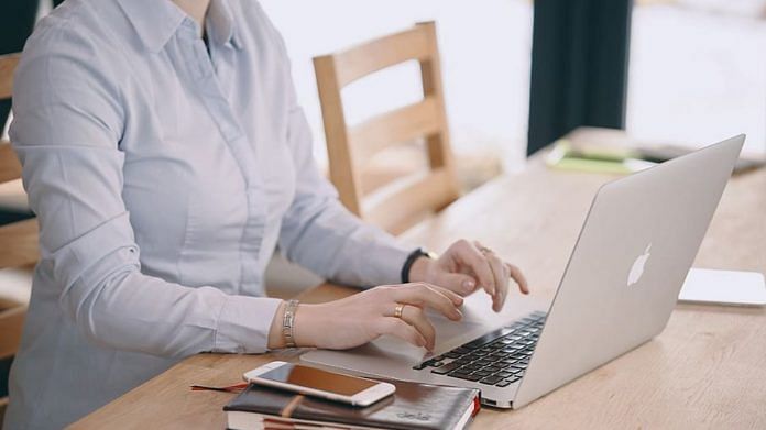 Woman working on a laptop (Representational image) | Needpix