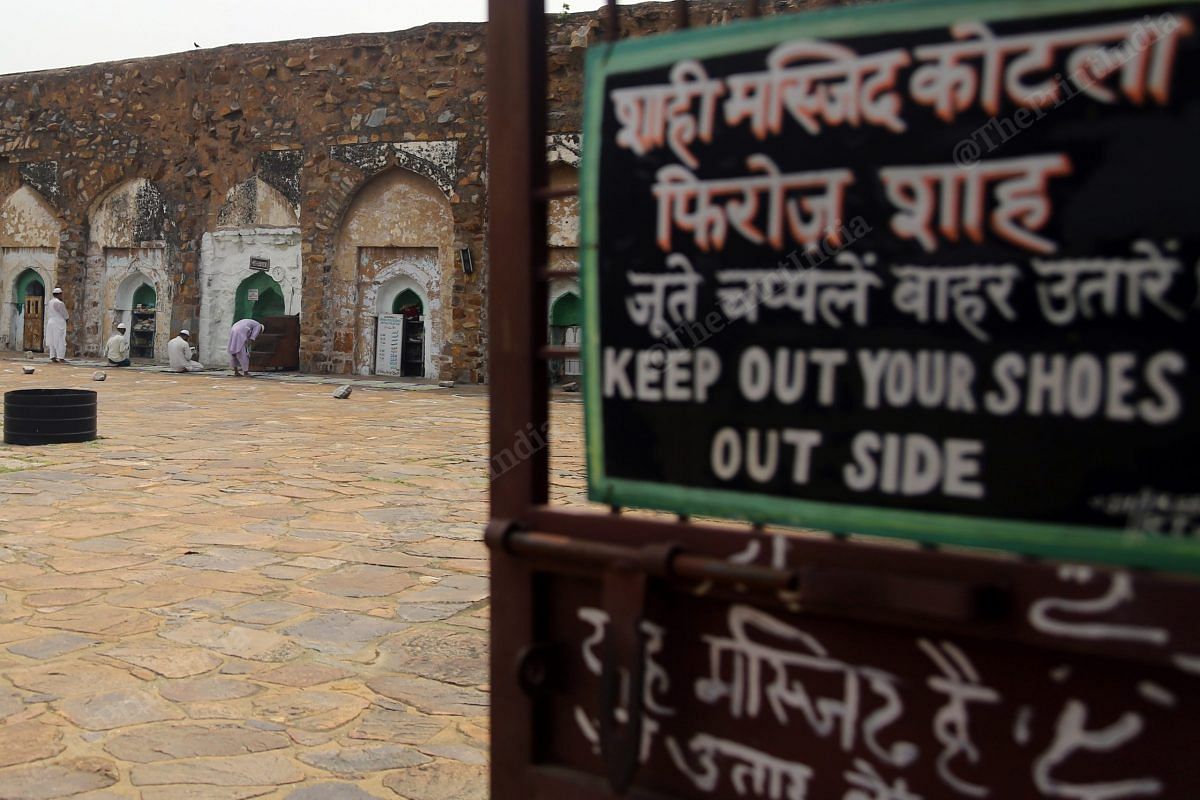 At Feroz Shah Kotla, people offer prayer | Photo: Suraj Singh Bisht | ThePrint 