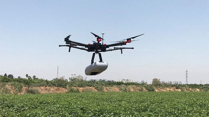 A drone operates to capture high-definition pictures of crops. | Bloomberg