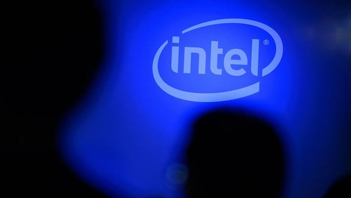 The Intel Co. logo is displayed in the company's booth at an expo in Japan. | Photographer: Akio Kon | Bloomberg
