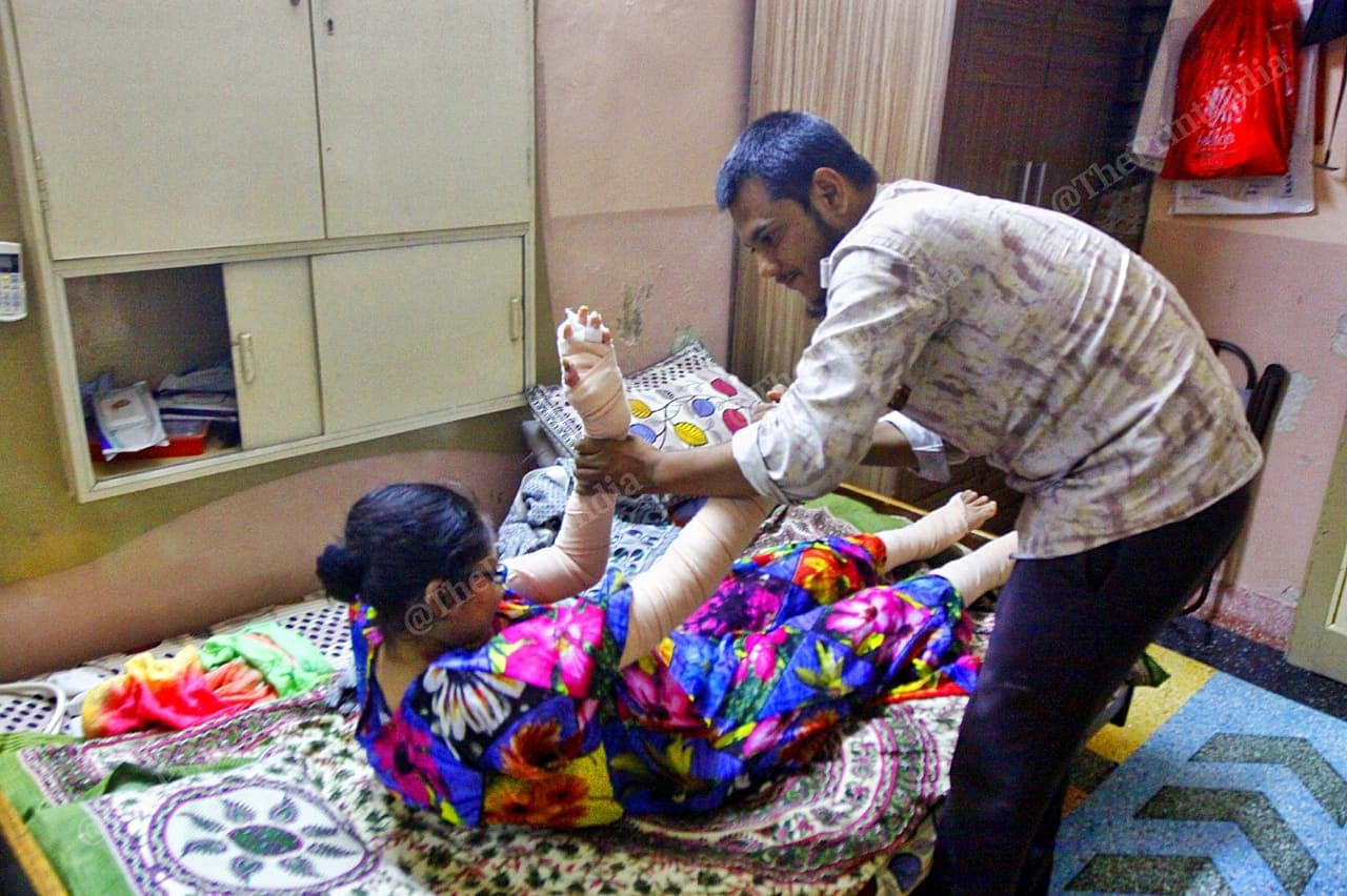 Misbah has limited independent mobility, so her husband helps her with everything | Praveen Jain | ThePrint