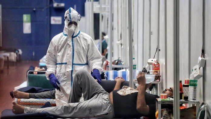 A health worker wearing PPE suit attends COVID-19 patients at quarantine Center, CWG Village, in New Delhi on 15 July 2020 (representational image) | ANI