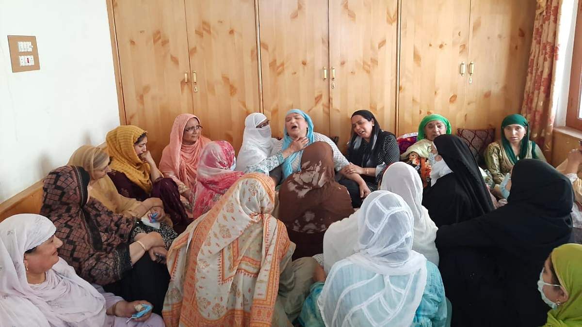 Bashir Khan's widow is consoled by her relatives and neighbours at their house in Srinagar | Azaan Javaid | ThePrint