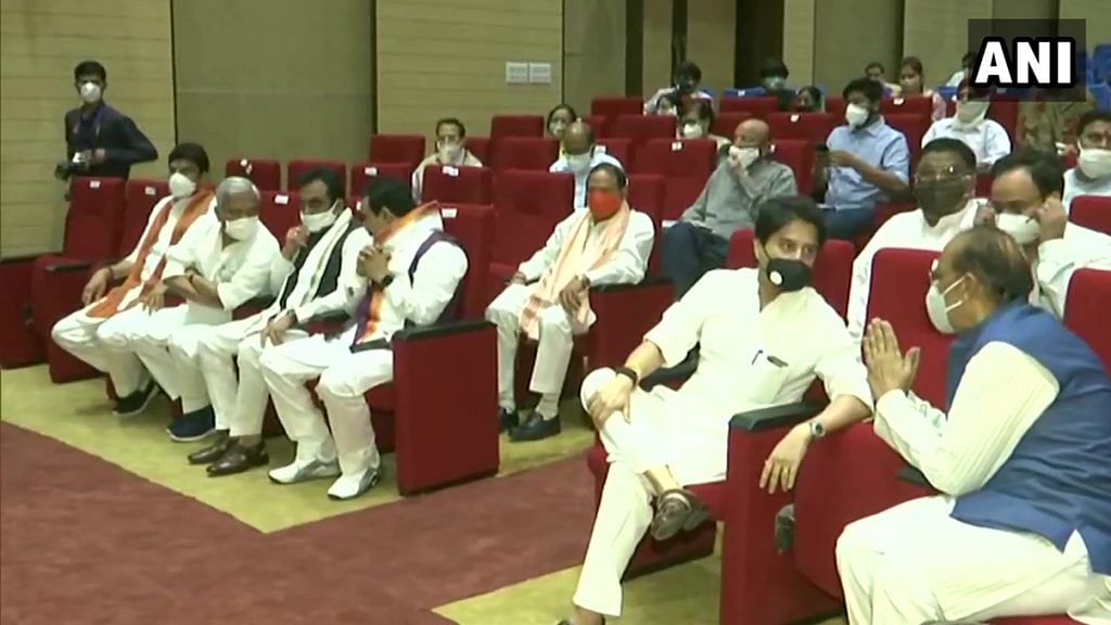 BJP leader Jyotiraditya Scindia and other leaders at Raj Bhawan in Bhopal for the oath taking ceremony of State Cabinet Ministers. | ANI | Twitter