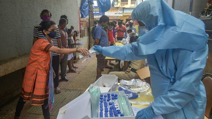 Municipal health workers screen residents for Covid-19 at Dadar in Mumbai, on 25 July 2020 | Mitesh Bhuvad | PTI