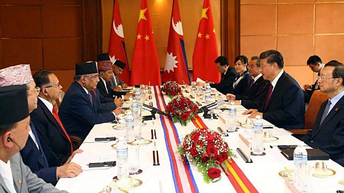 Nepal PM K.P. Sharma Oli (left, centre) and Chinese President Xi Jinping (right, centre) with their respective delegations at a 2019 meeting in Kathmandu | Photo: ANI