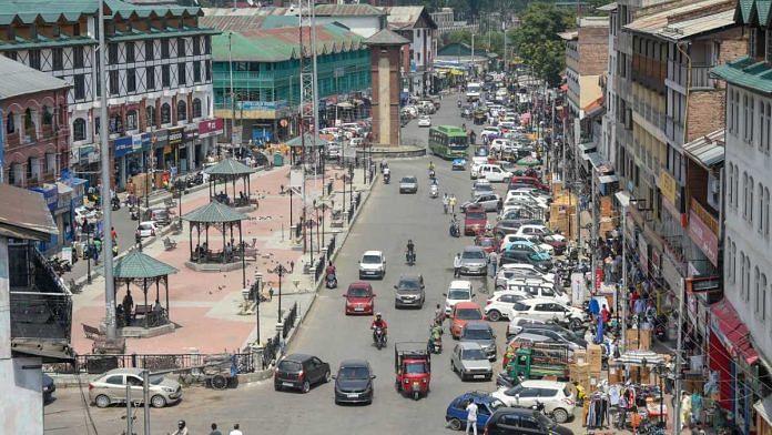 Vehicles go through Lal Chowk after Jammu and Kashmir relaxed the lockdown restrictions ahead of Eid al-Adha, in Srinagar, on 29 July 2020 | S Irfan | PTI