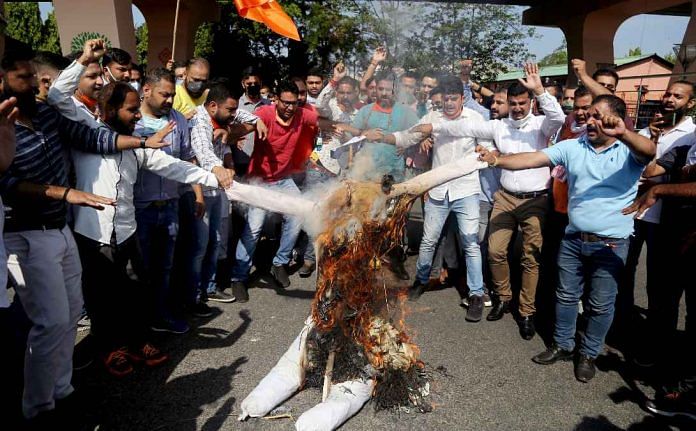 Bharatiya Janata Yuva Morcha members carry out a protest in Jammu Thursday against the killing of Kashmir BJP leader Wasim Bari and his father and brother | ANI