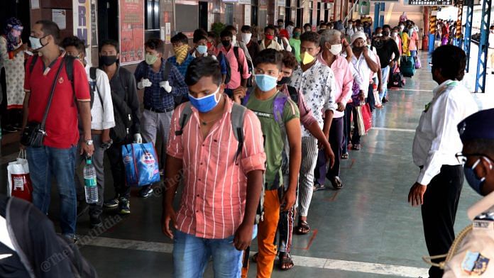 Returning migrants line up at the Dadar Railway Station in Mumbai | Photo: Vasant Prabhu | ThePrint