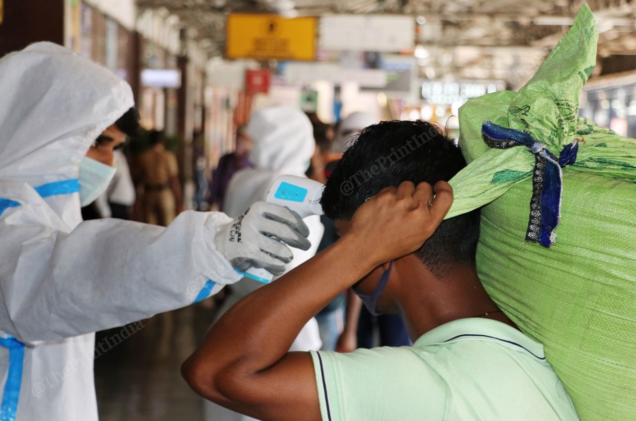 A migrant being checked for temperature at the Dadar Railway Station | Photo: Vasant Prabhu | ThePrint