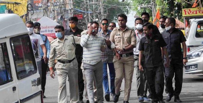 Gangster Vikas Dubey being apprehended by police personnel in Ujjain on 9 July (representational image) | PTI Photo